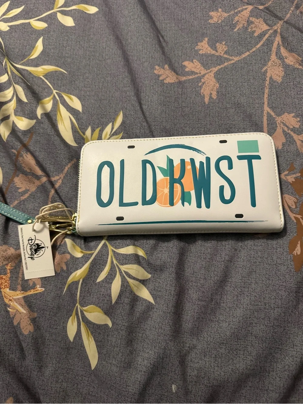 Loungefly White Wristlet Wallet with Teal and Orange License Plate Design